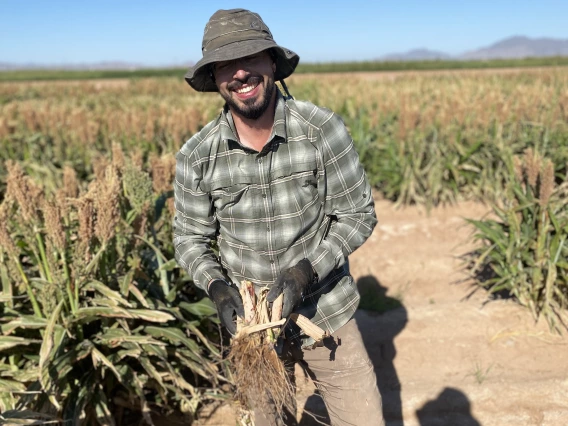 Man holding crop